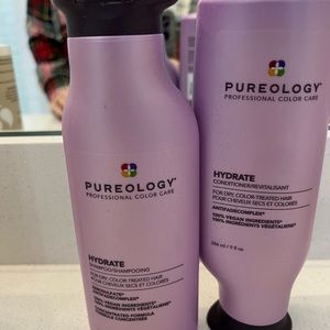 Pureology shampoo and conditioner. Half full.